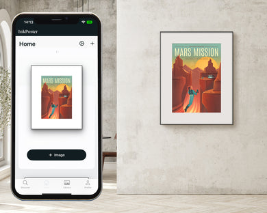 Modern room with a digital e-ink art frame on the wall displaying a futuristic illustrated poster with text "Mars Mission," while a smartphone in the foreground shows the InkPoster app interface for selecting and changing images remotely