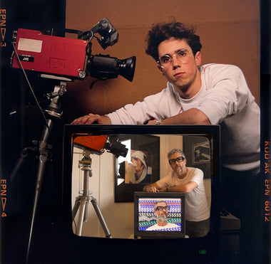Portrait of Adrian Wilson with vintage video equipment by Ian T. Tilton