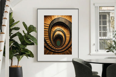 InkPoster displaying spiral architectural photography on a color ePaper art display