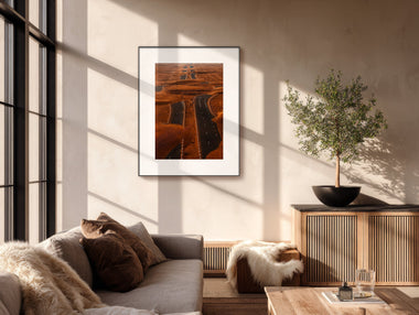 InkPoster Tela 40.5 color ePaper art display in a modern living room interior