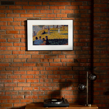 Artwork displayed on a brick wall with InkPoster